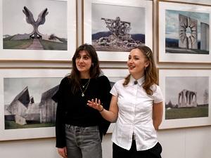 Two women in photo exhibition
