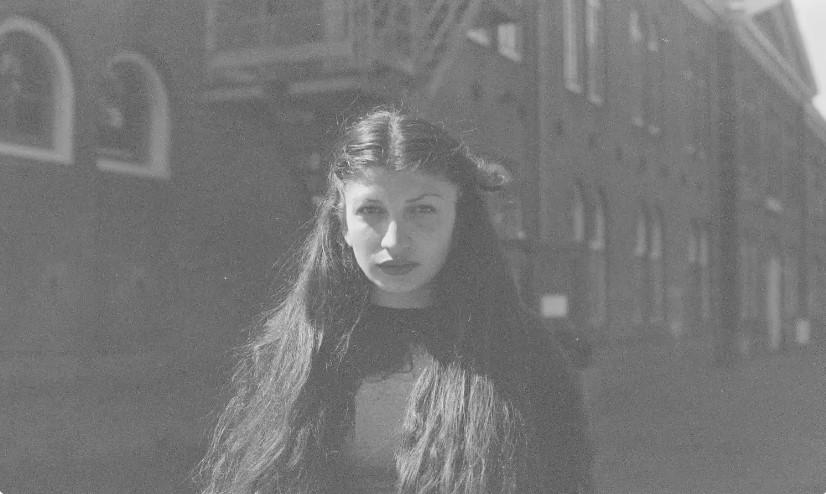 Woman with dark hair in balck & white