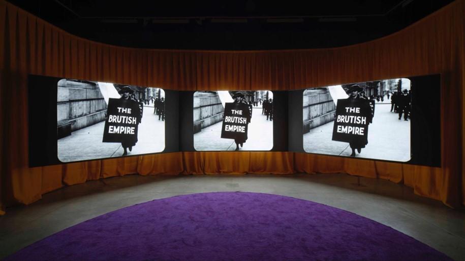 Three projected images in art gallery